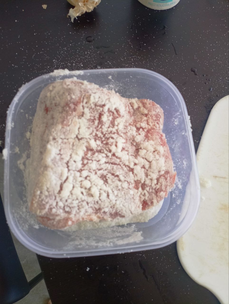 Beef covered in salt for curing Beef covered in salt for curing