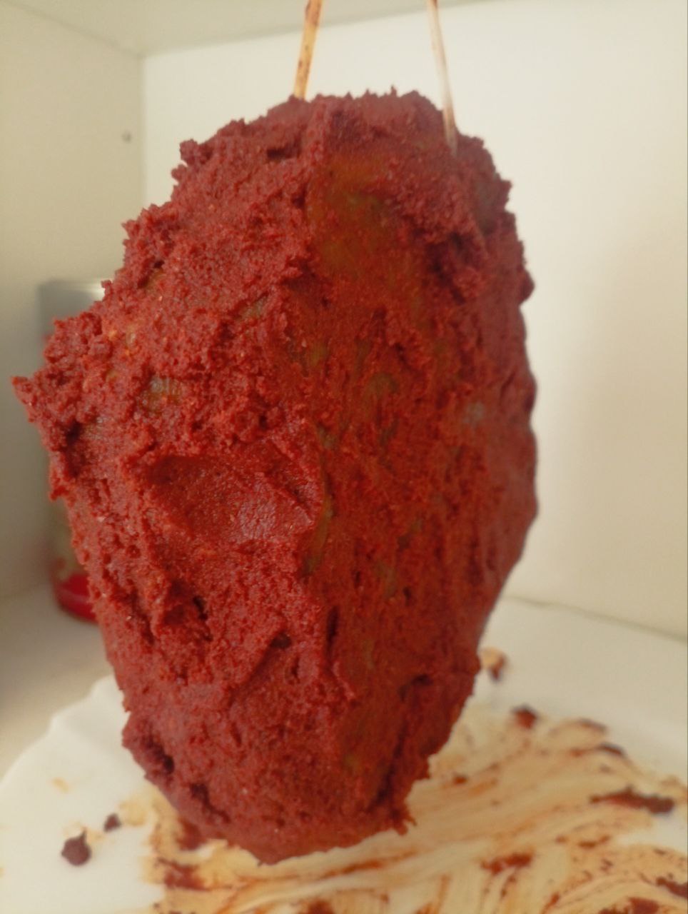 Spiced basturma drying Basturma coated with spices and hung for drying
